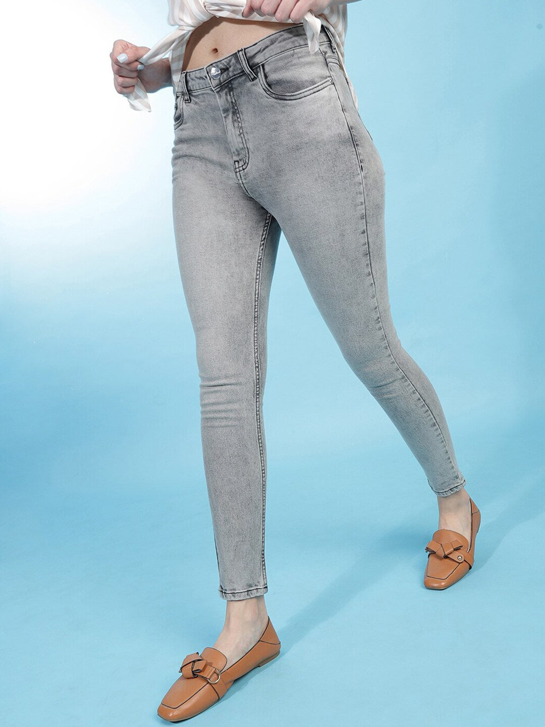 Shop Women Distressed Slim-Fit Jeans Online.