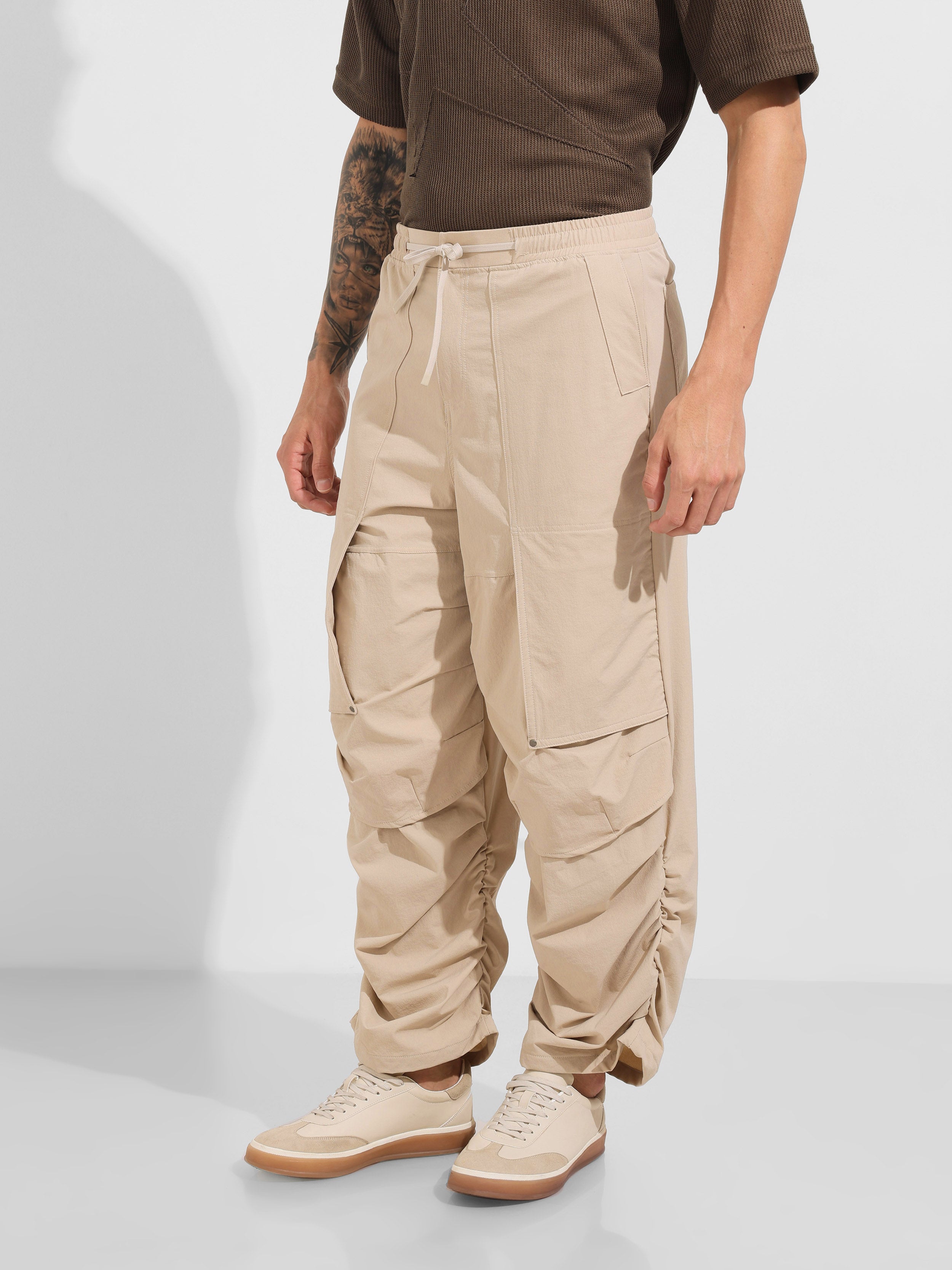 Men's Beige Baggy Fit Solid Utility Trousers