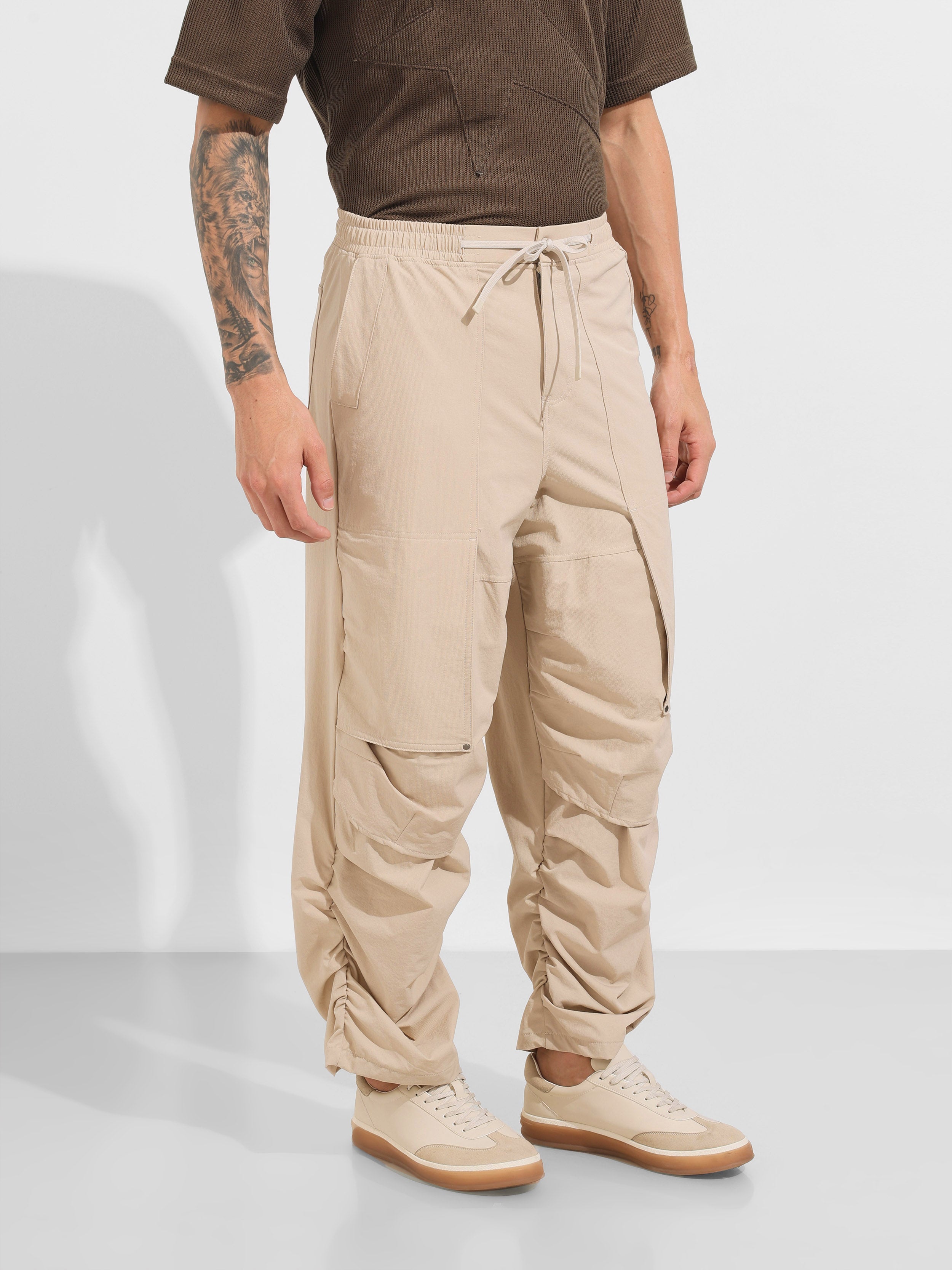 Men's Beige Baggy Fit Solid Utility Trousers