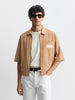 Men's Khaki Oversized Fit Solid Warner Bros Jacket