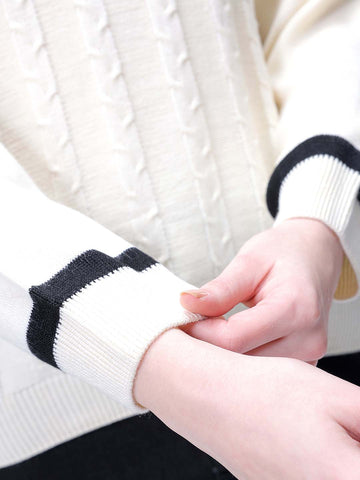 Women's Off White Loose Fit Solid Sweater
