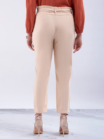 Shop Women's Beige Slim Solid Elasticated Ruffle Waist Trouser Online.