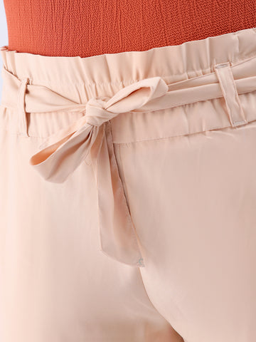 Shop Women's Beige Slim Solid Elasticated Ruffle Waist Trouser Online.
