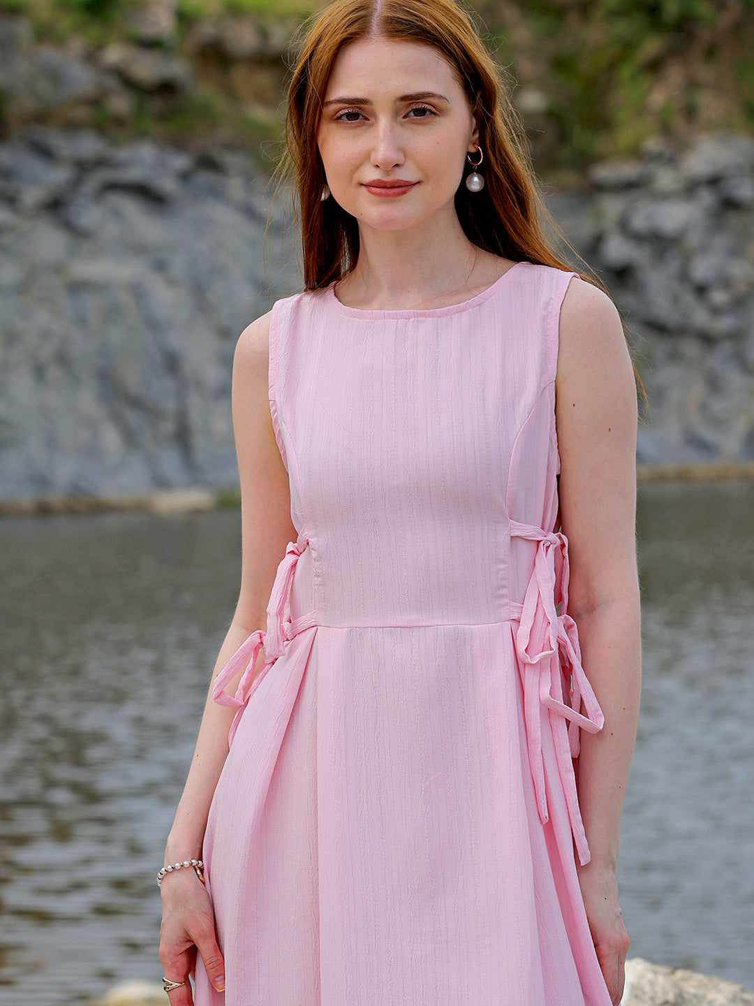 Shop Women's Pink Flare Textured Round Neck Midi Dress Online.