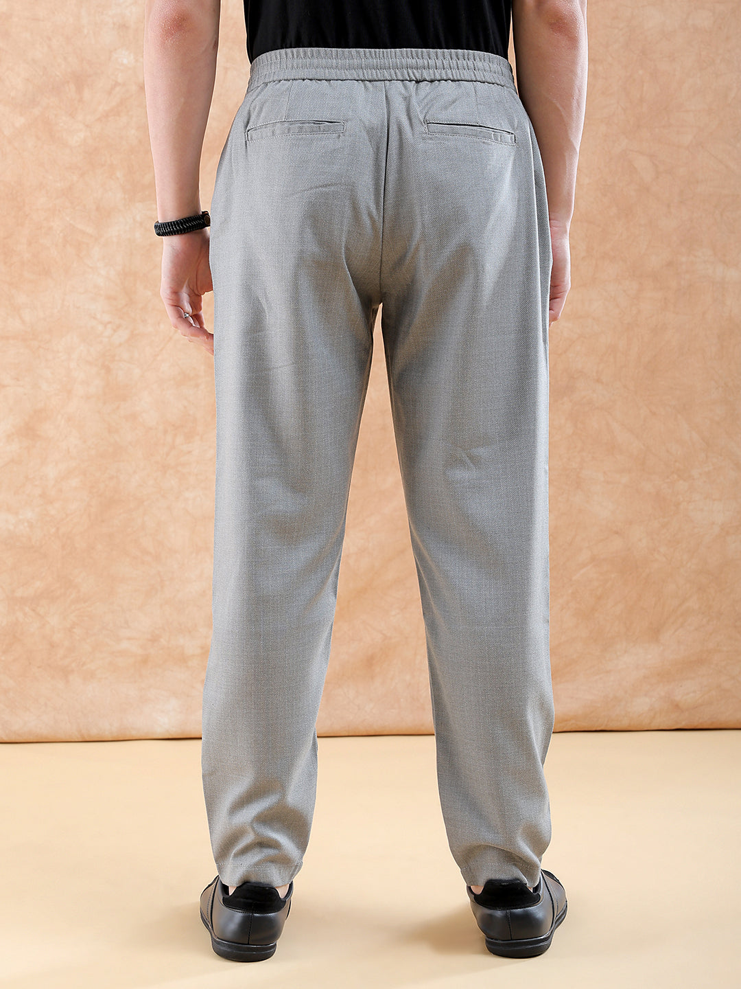 Shop Men Solid Trousers Online.