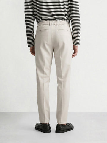 Men's Beige Relaxed Fit Solid Casual Trousers