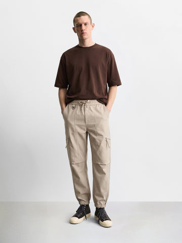 Men's White Relaxed Fit Solid Utility Joggers