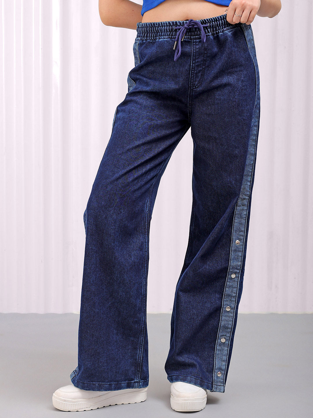 Shop Women's Solid Flared High Rise Five Pocket Jeans Online.