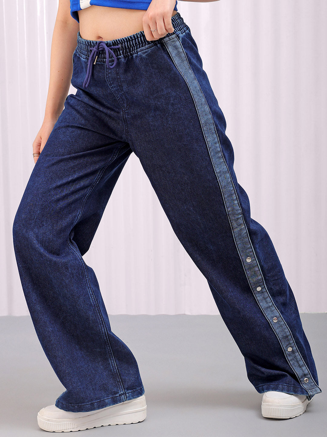 Shop Women's Solid Flared High Rise Five Pocket Jeans Online.