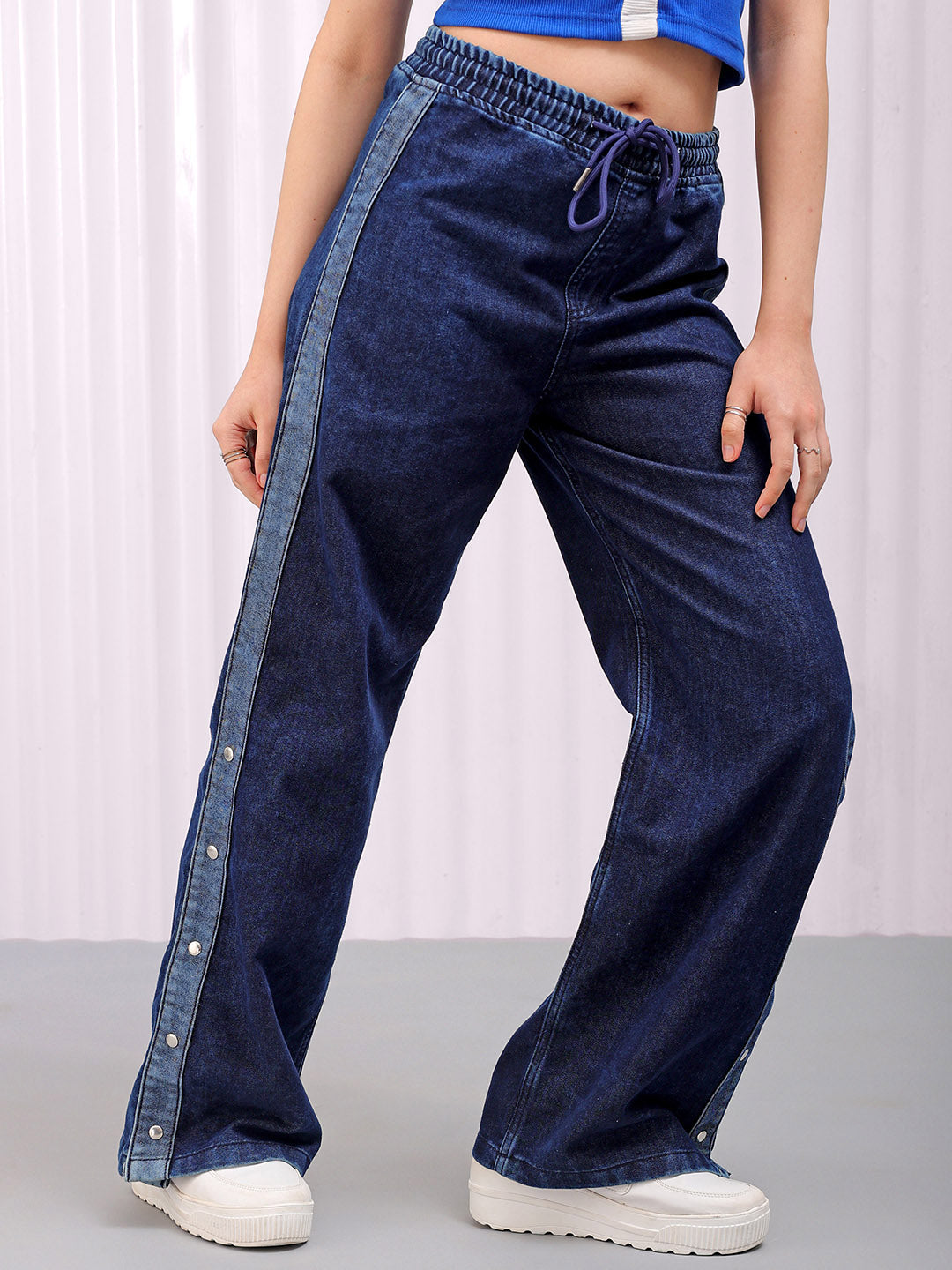 Shop Women's Solid Flared High Rise Five Pocket Jeans Online.