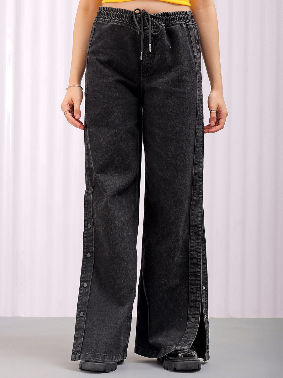 Shop Women's Solid Flared High Rise Five Pocket Jeans Online.