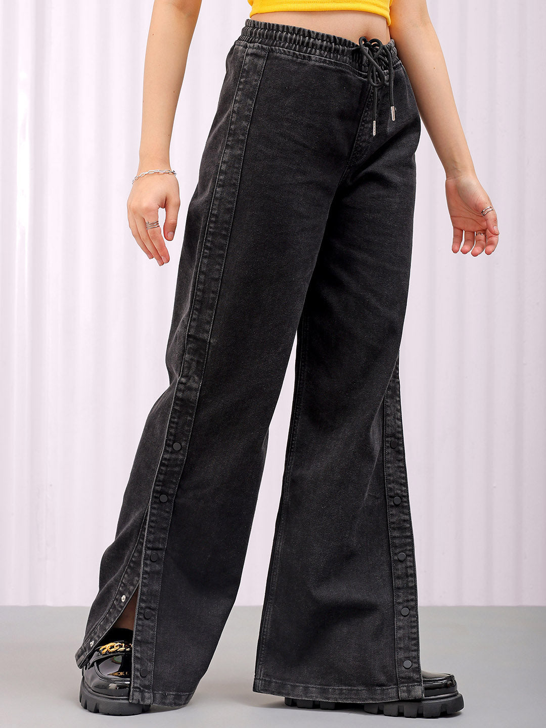 Shop Women's Solid Flared High Rise Five Pocket Jeans Online.