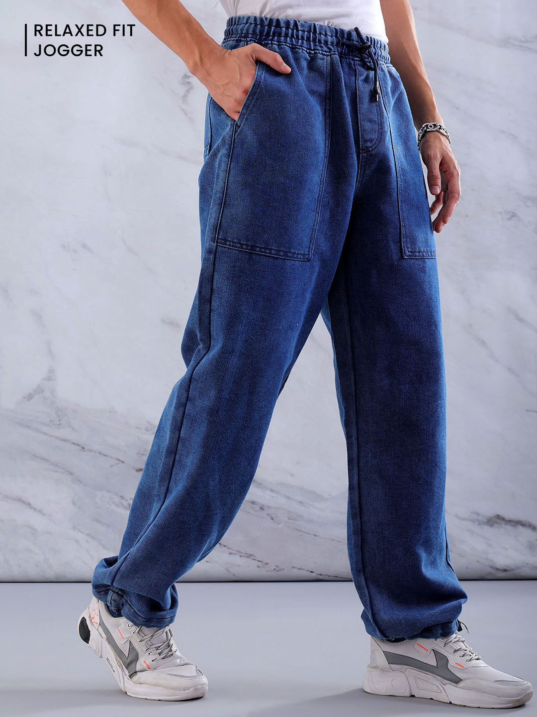 Shop Men's Solid Relaxed Fit Denim Joggers Online.