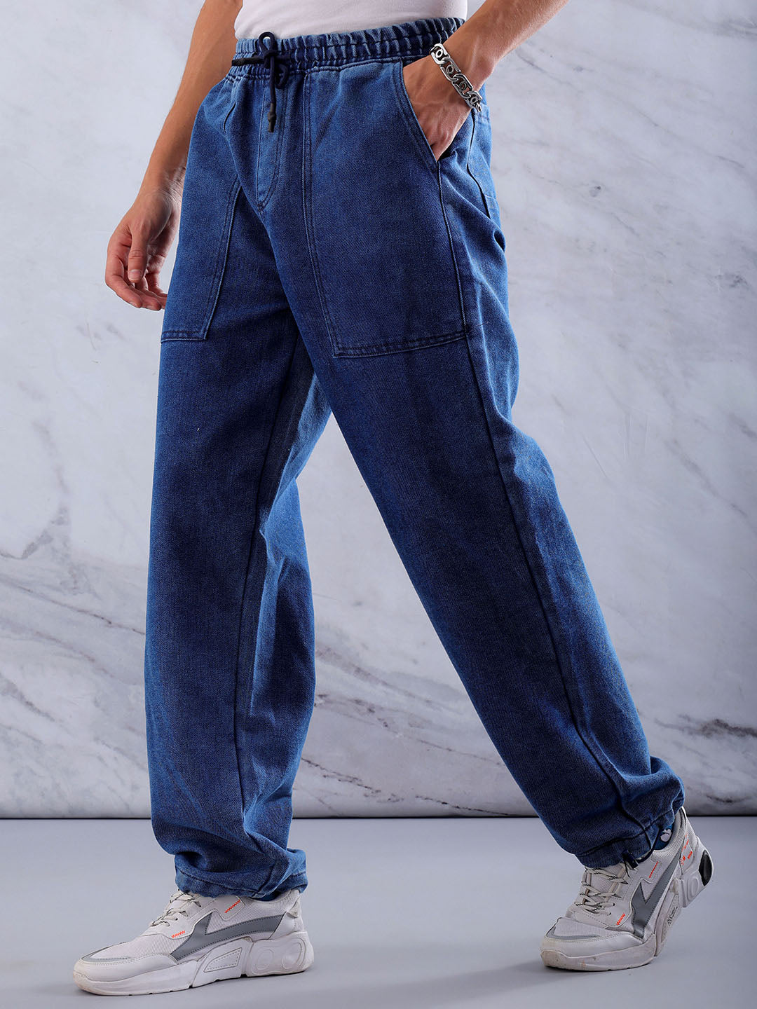 Shop Men's Solid Relaxed Fit Denim Joggers Online.