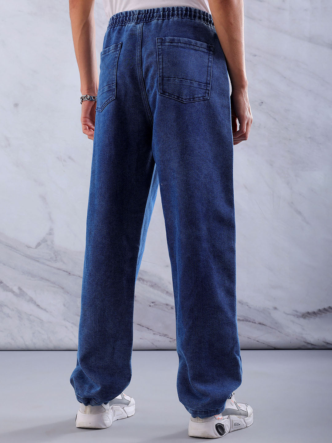 Shop Men's Solid Relaxed Fit Denim Joggers Online.