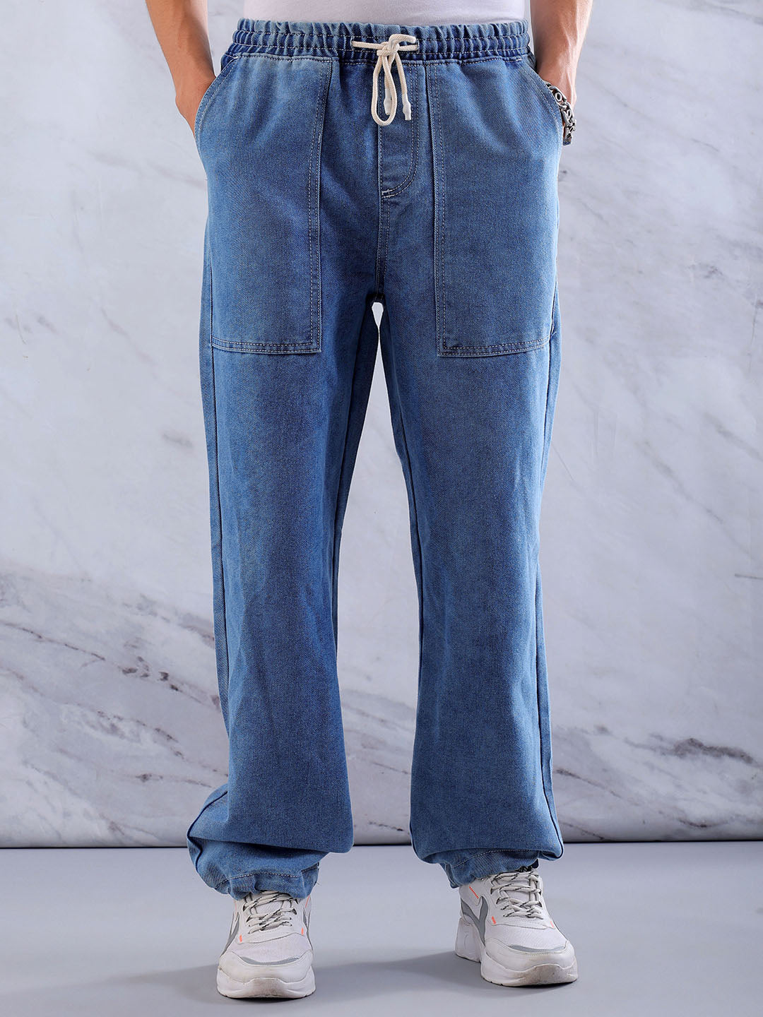 Shop Men's Solid Relaxed Fit Denim Joggers Online.