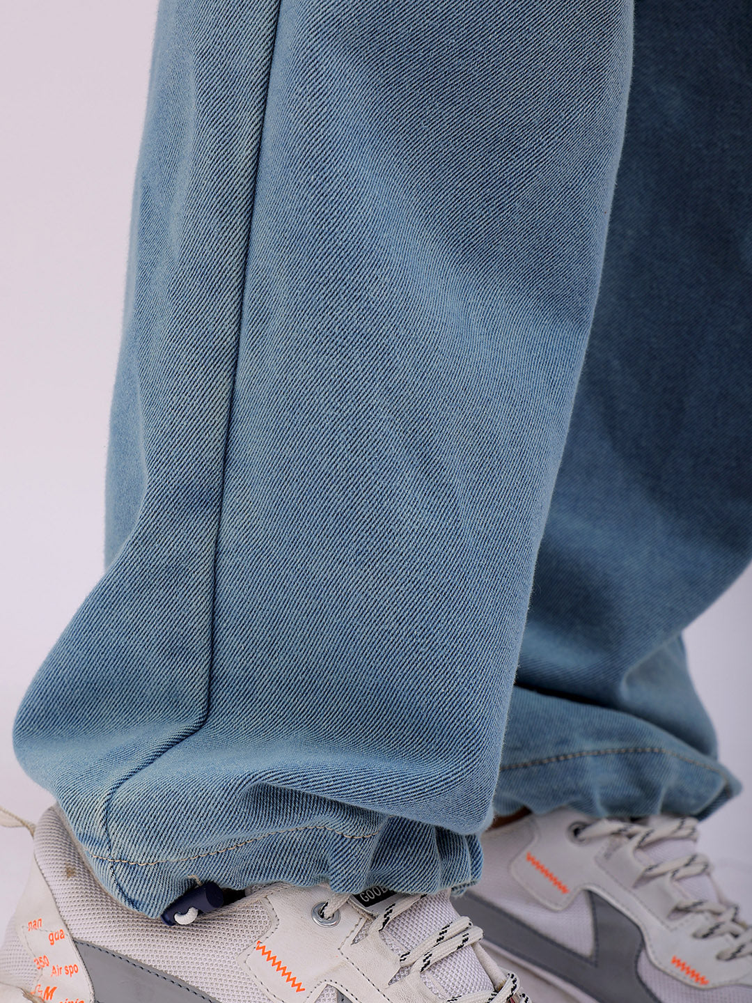 Shop Men's Solid Relaxed Fit Denim Joggers Online.