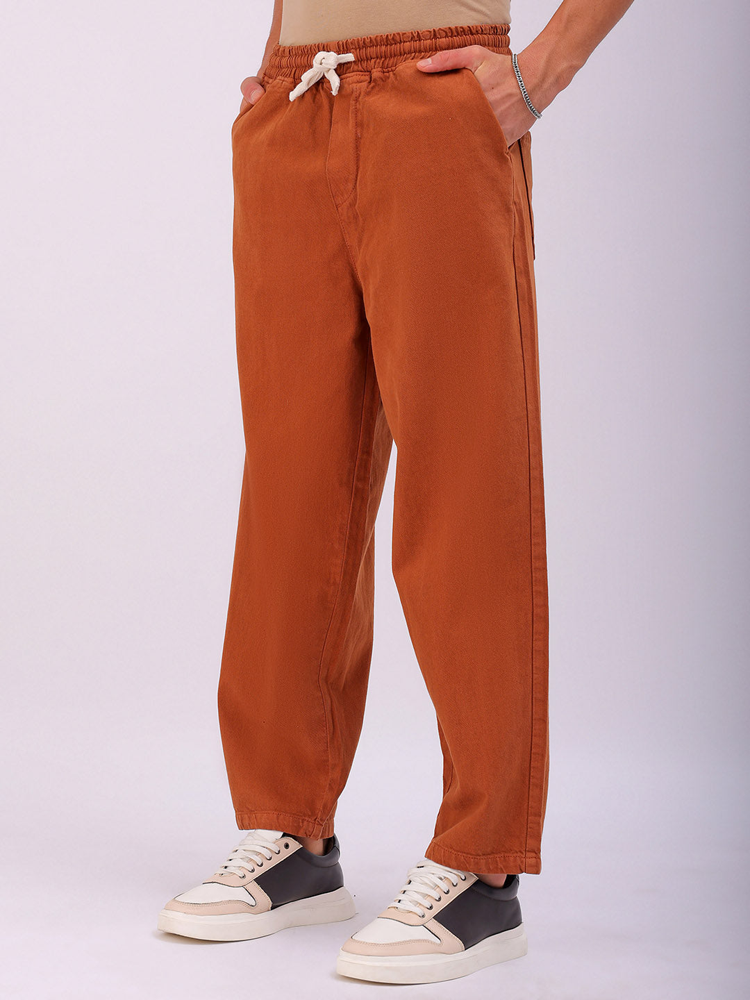 Shop Men's Solid Loose Fit Denim Jogger Online.