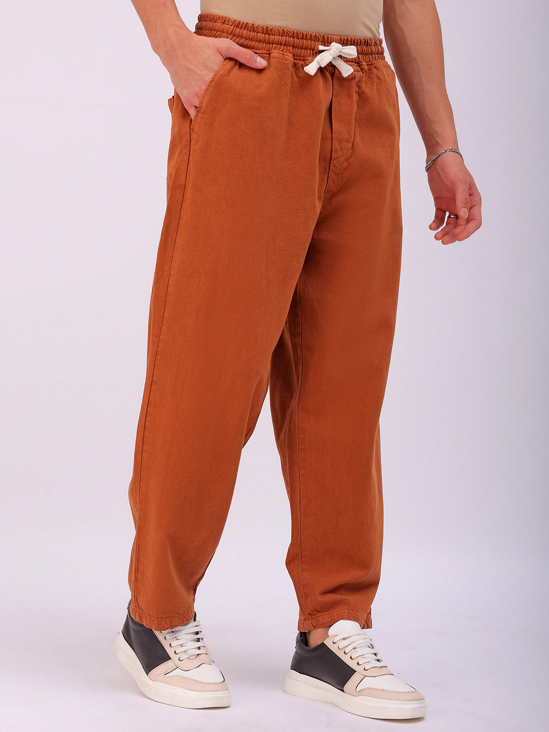 Shop Men's Solid Loose Fit Denim Jogger Online.