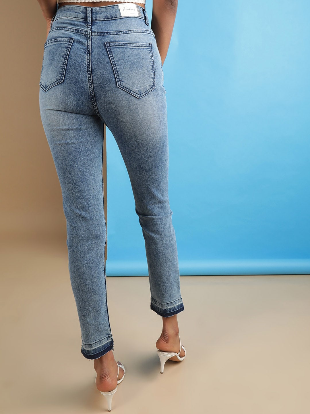 Shop Women Mid Wash Straight Fit Denim Jeans Online.