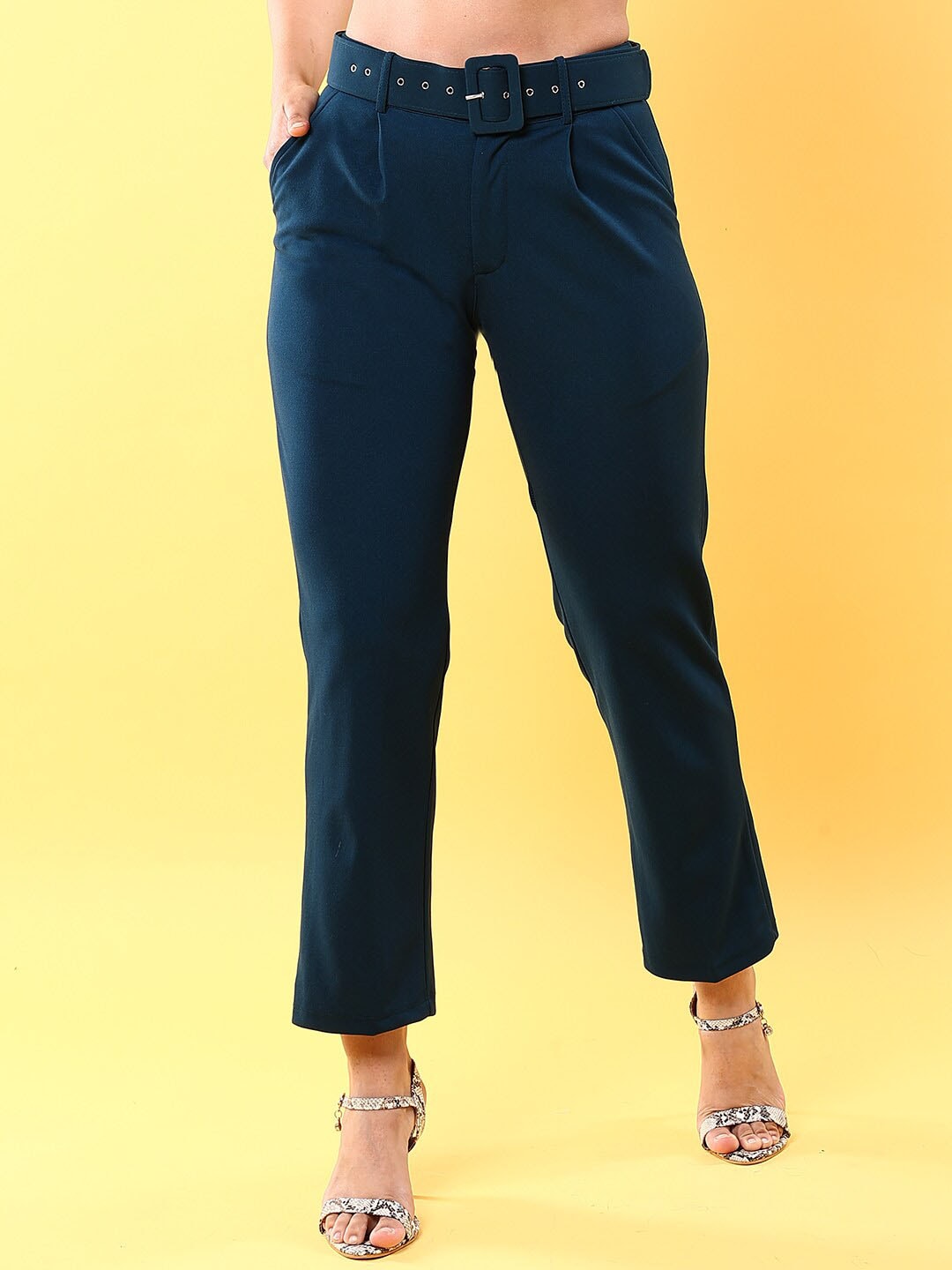 Shop Women Tapered Pleated Pant With Belt Online.