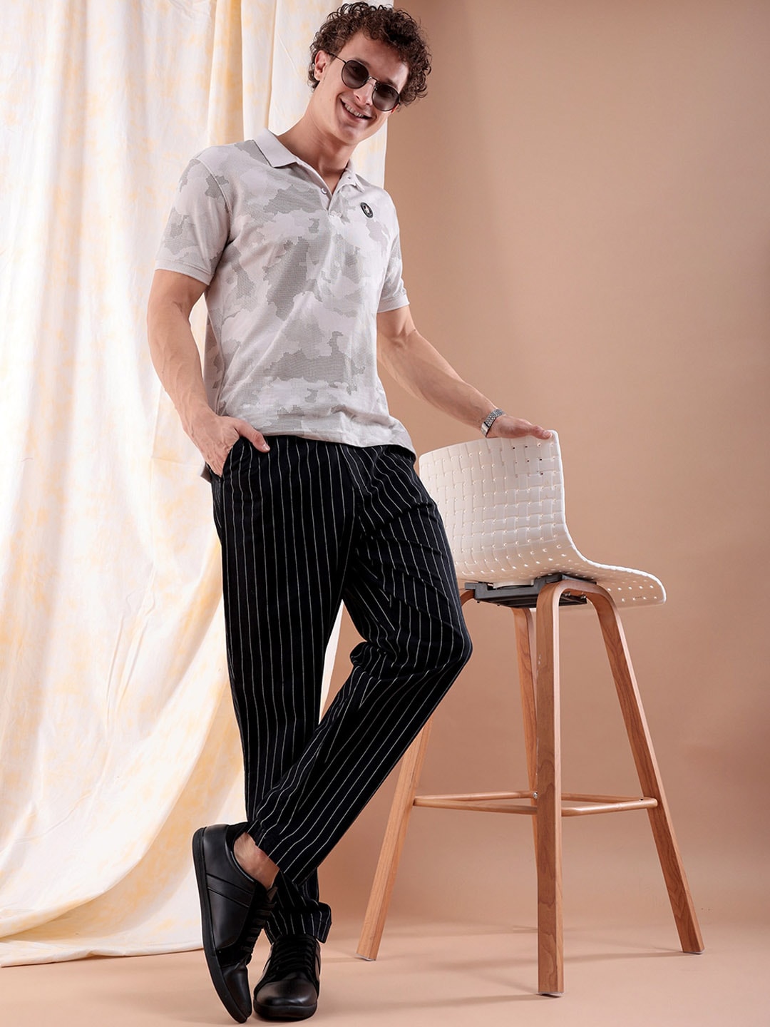 Shop Men Vertical Stripes Trousers Online.