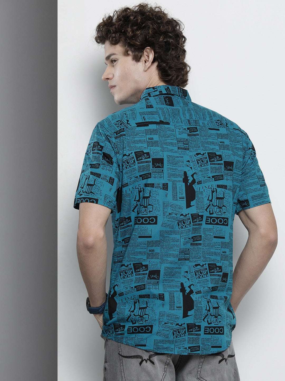 Shop The Indian Garage Co Men Teal Blur & Black Comfort Newspaper Printed Cotton Shirt Online.