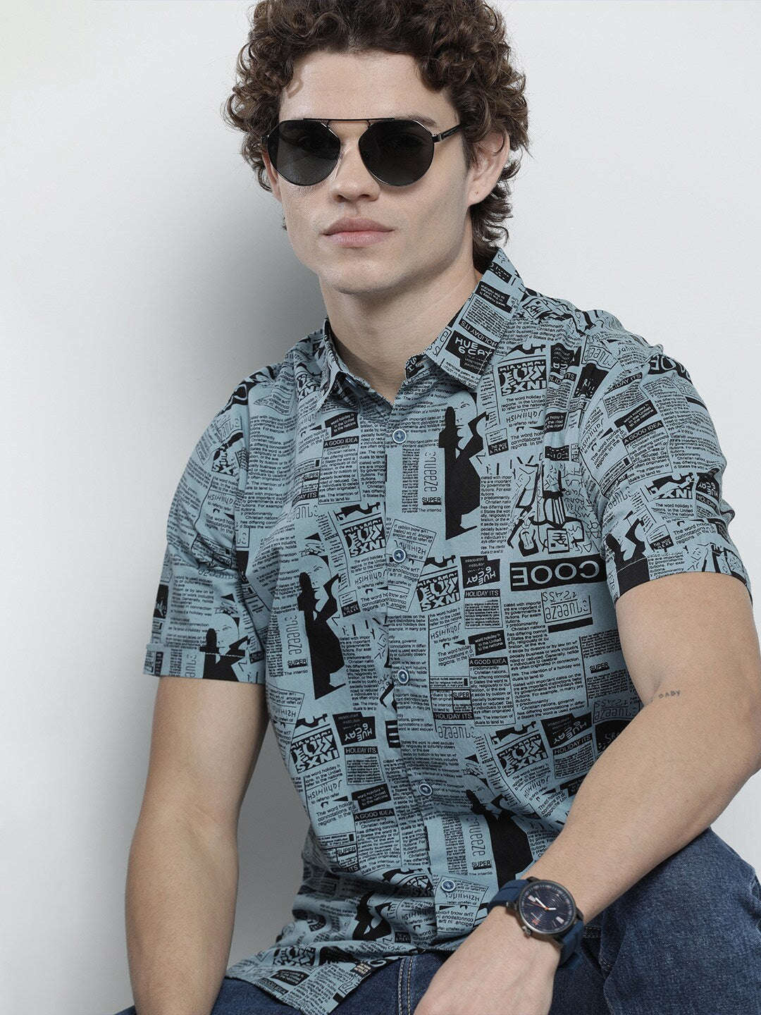 Shop The Indian Garage Co Men Teal Blue & Black Comfort Newspaper Printed Cotton Shirt Online.