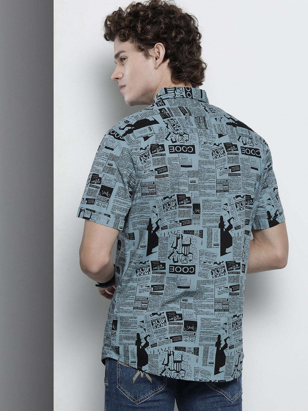 Shop The Indian Garage Co Men Teal Blue & Black Comfort Newspaper Printed Cotton Shirt Online.