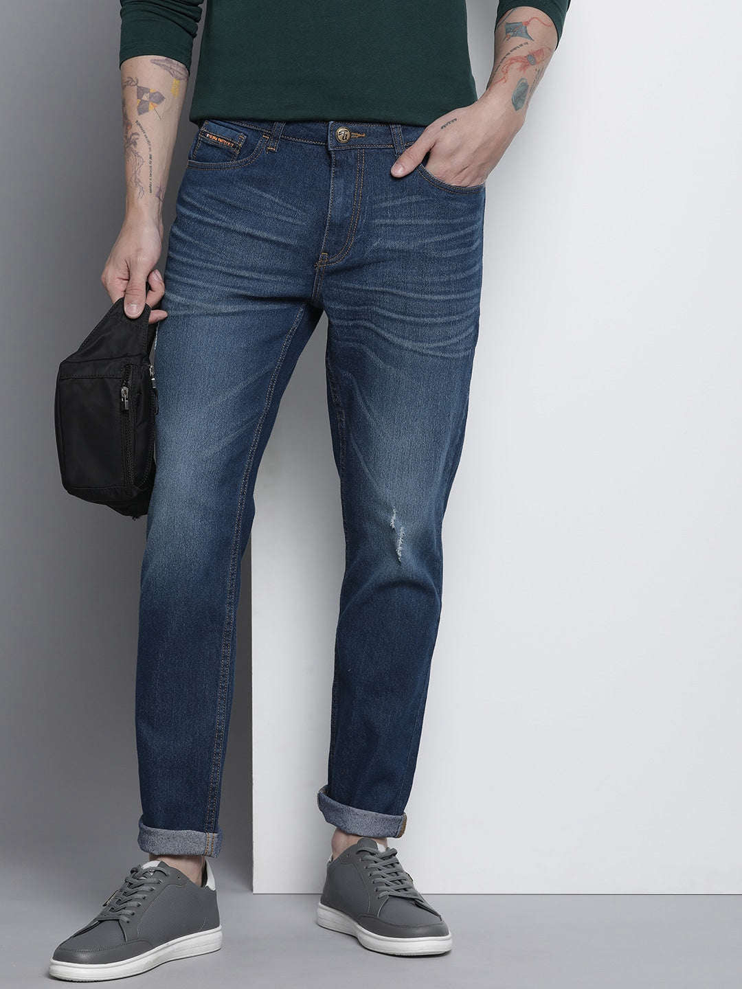 Shop Men Whisker Distressed Jeans Online.