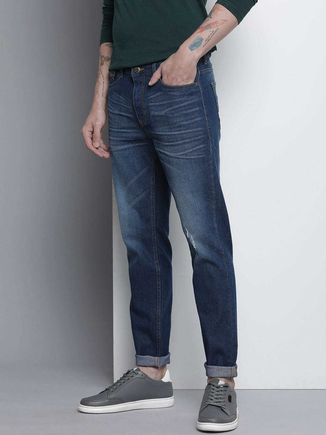 Shop Men Whisker Distressed Jeans Online.