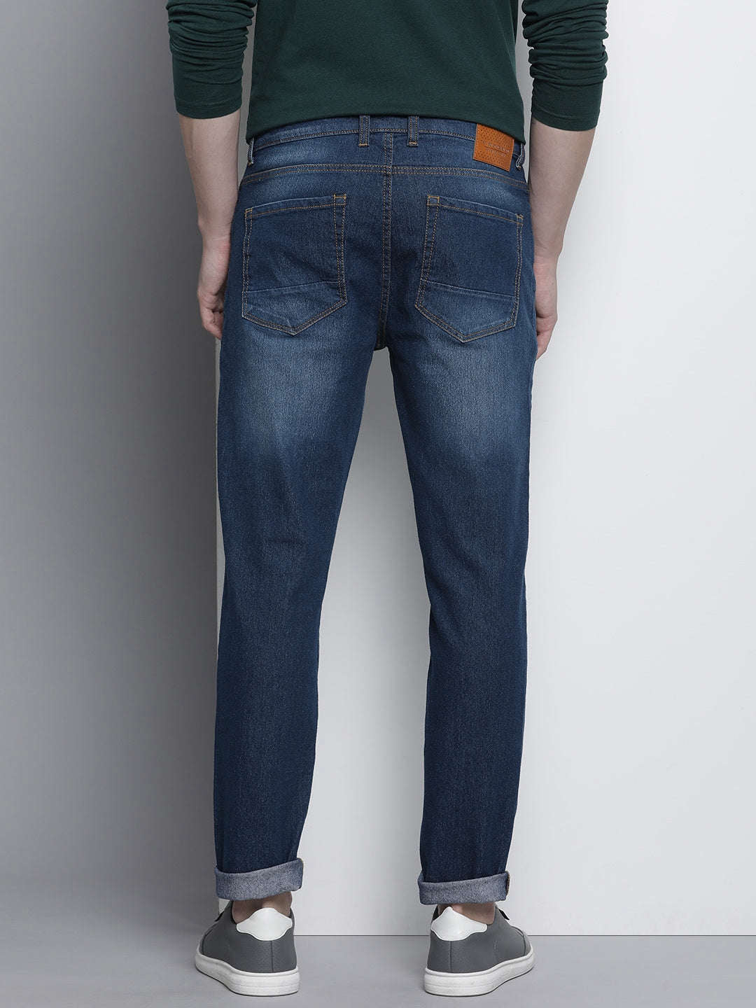 Shop Men Whisker Distressed Jeans Online.