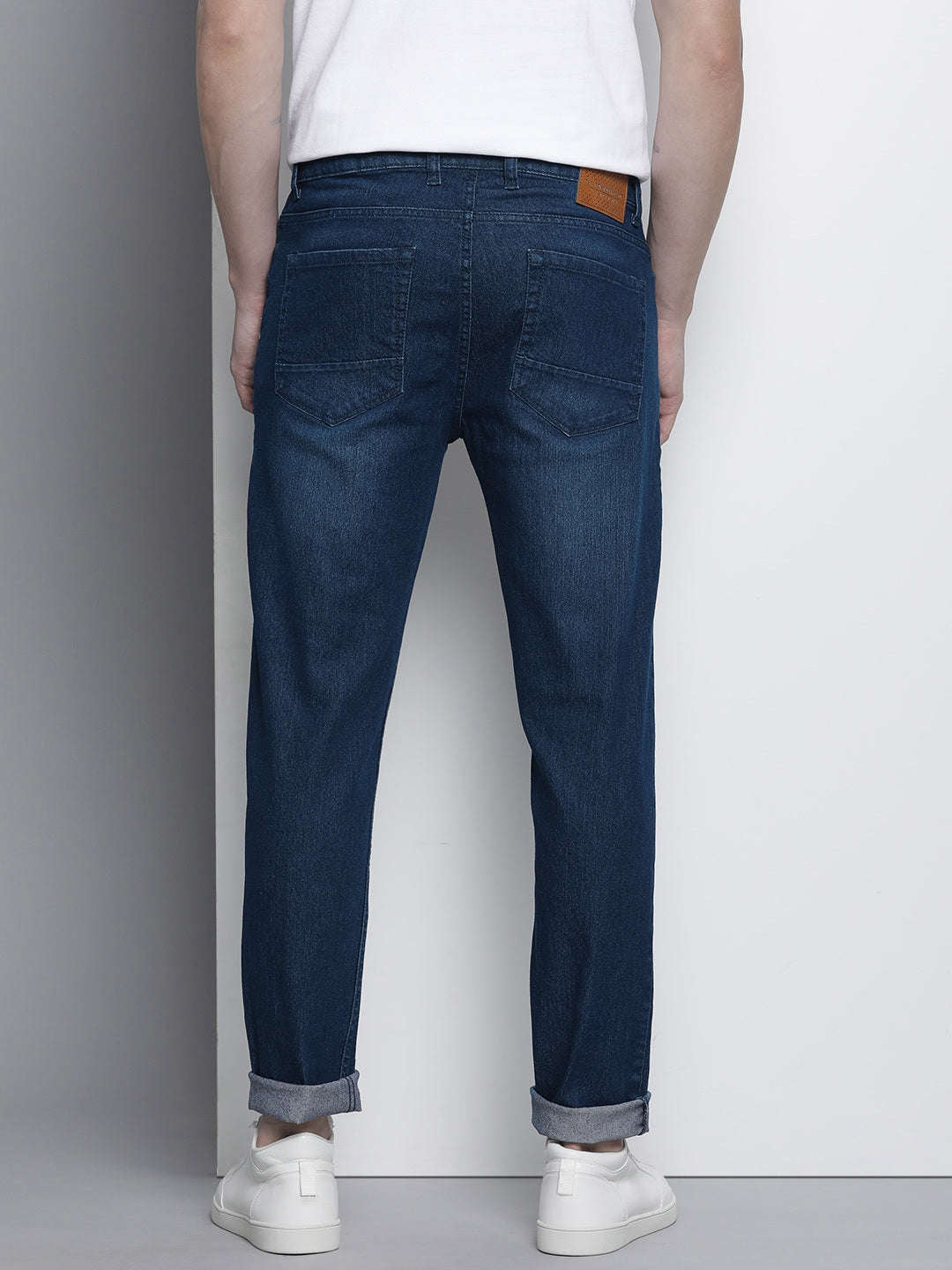 Shop Men Whisker Distressed Jeans Online.