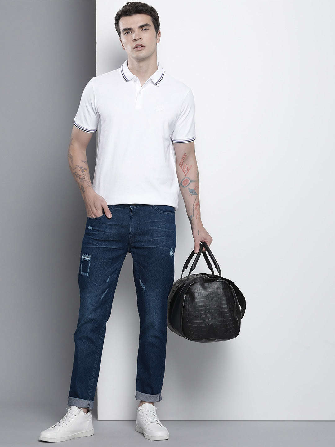 Shop Men Whisker Distressed Jeans Online.