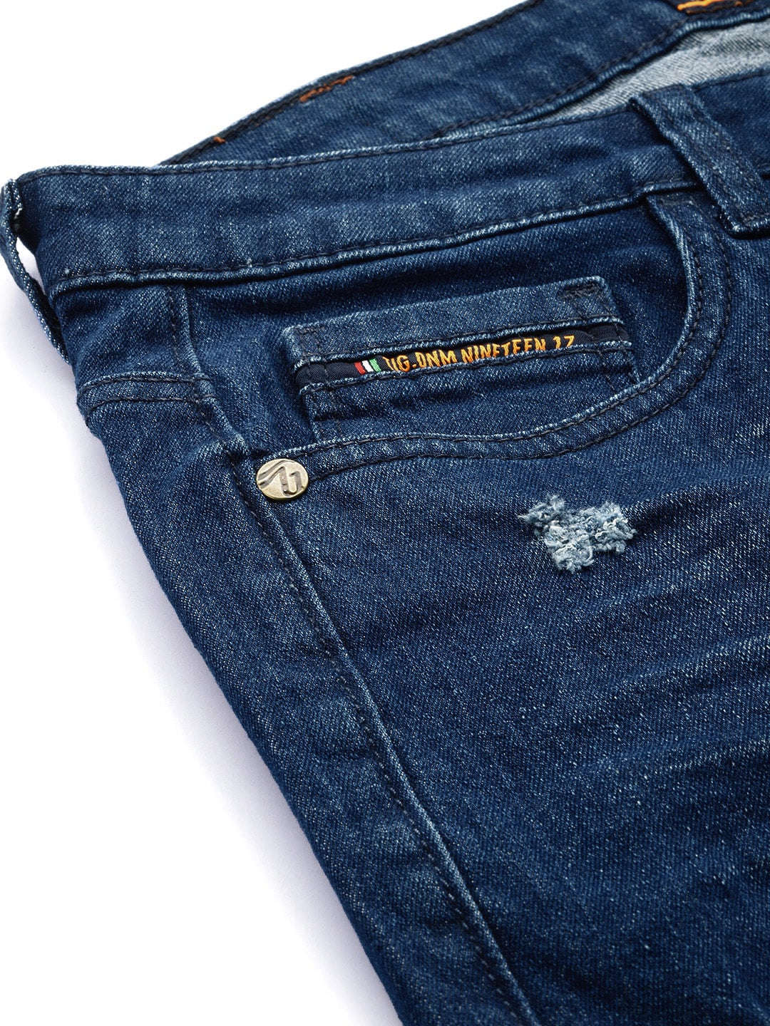 Shop Men Whisker Distressed Jeans Online.