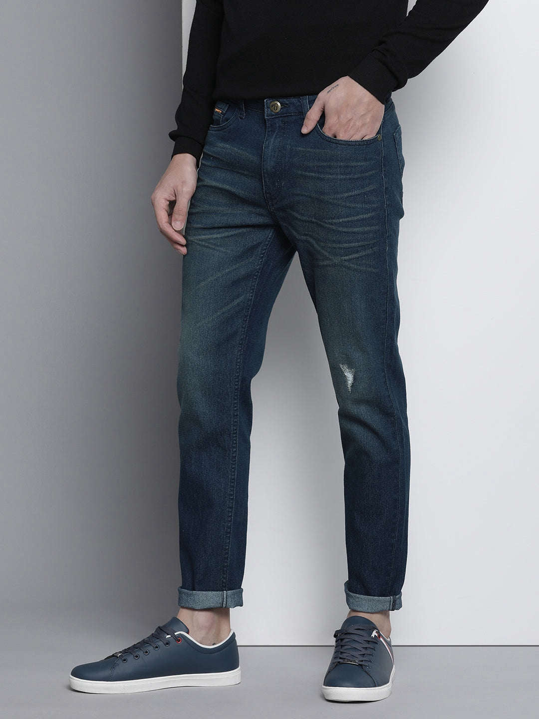 Shop Men Whisker Distressed Jeans Online.