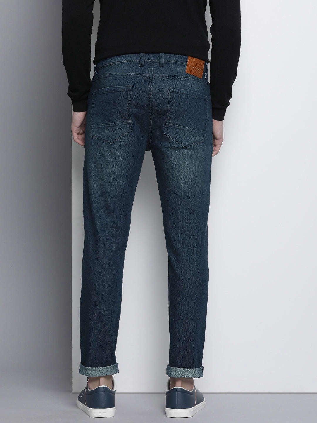 Shop Men Whisker Distressed Jeans Online.