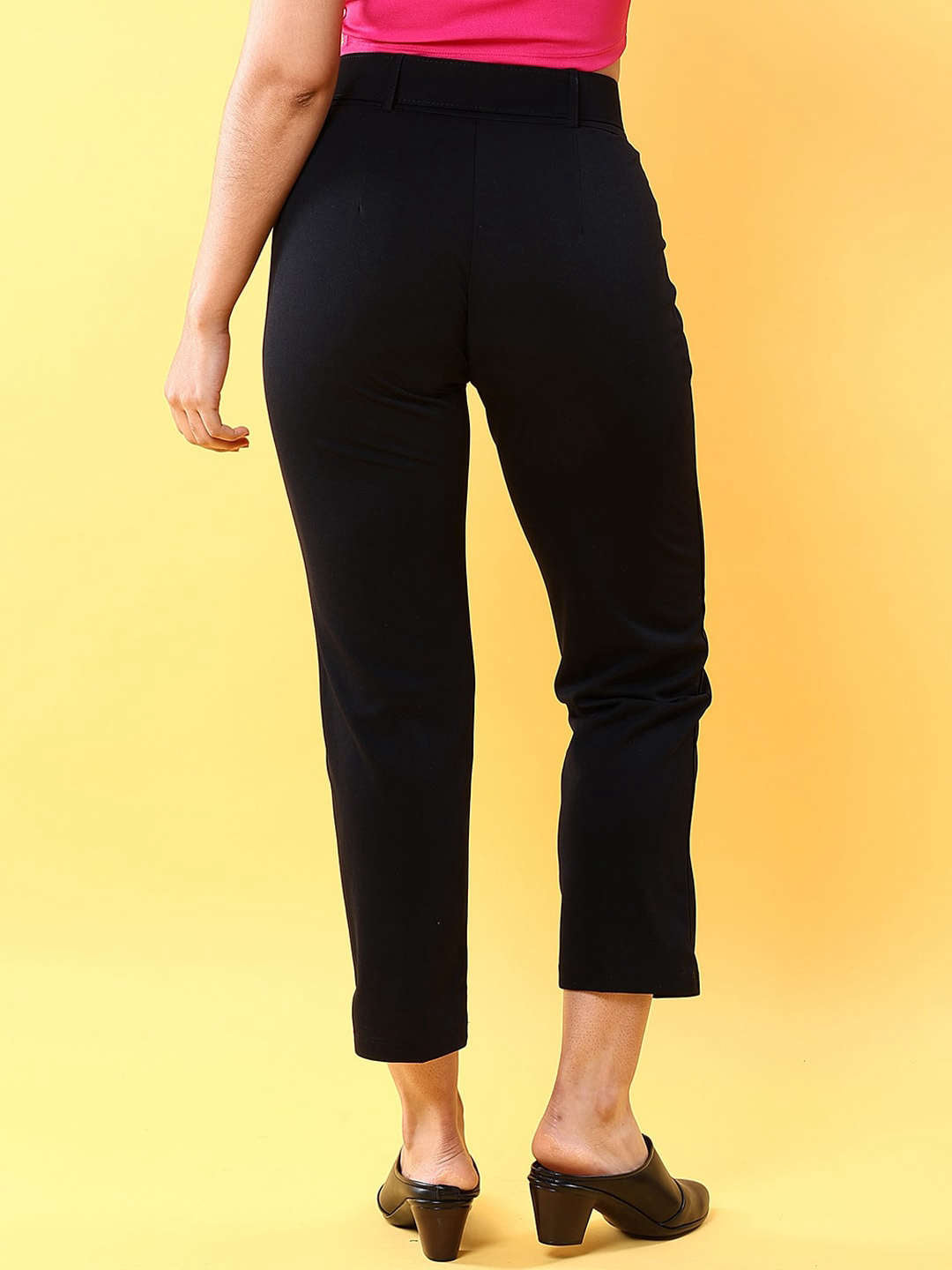 Shop Women Tapered Pleated Pant With Belt Online.