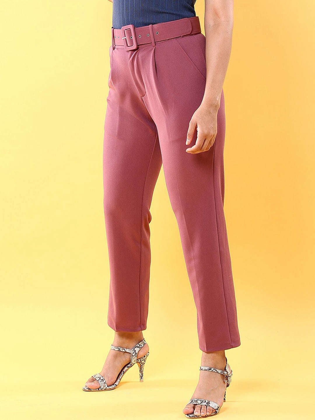 Shop Women Tapered Pleated Pant With Belt Online.