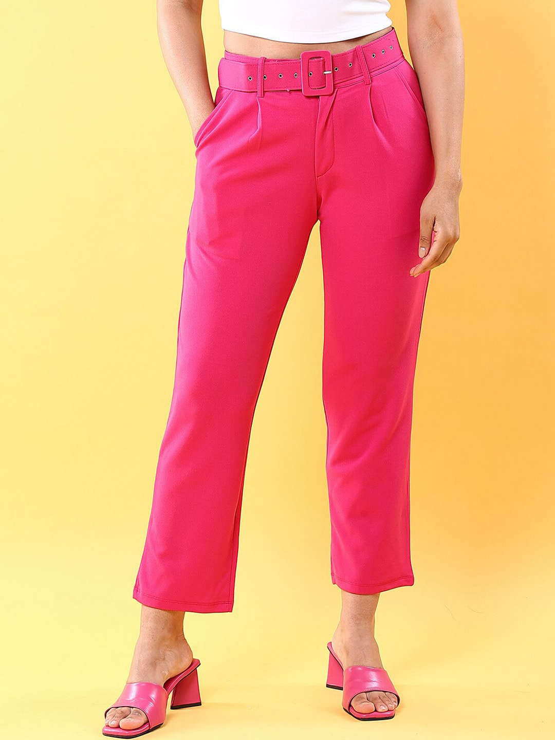 Shop Women Tapered Pleated Pant With Belt Online.