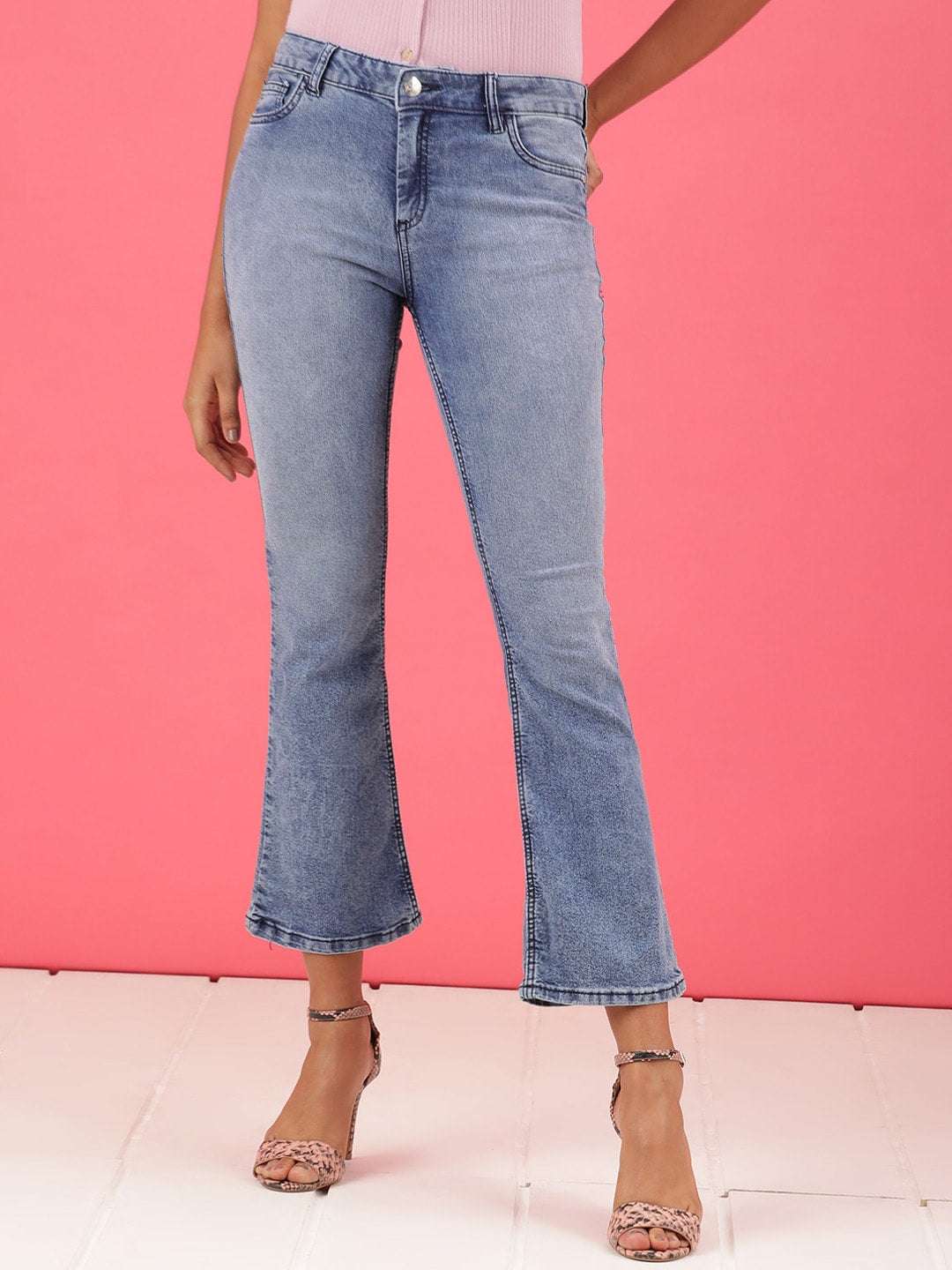 Shop Women Mid Wash Bootcut Denim Jeans Online.