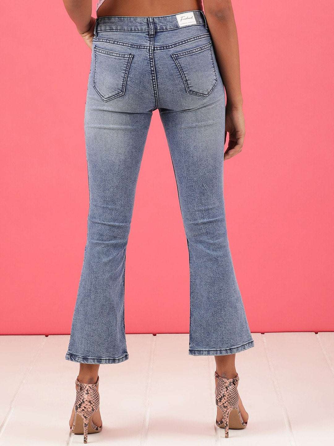 Shop Women Mid Wash Bootcut Denim Jeans Online.