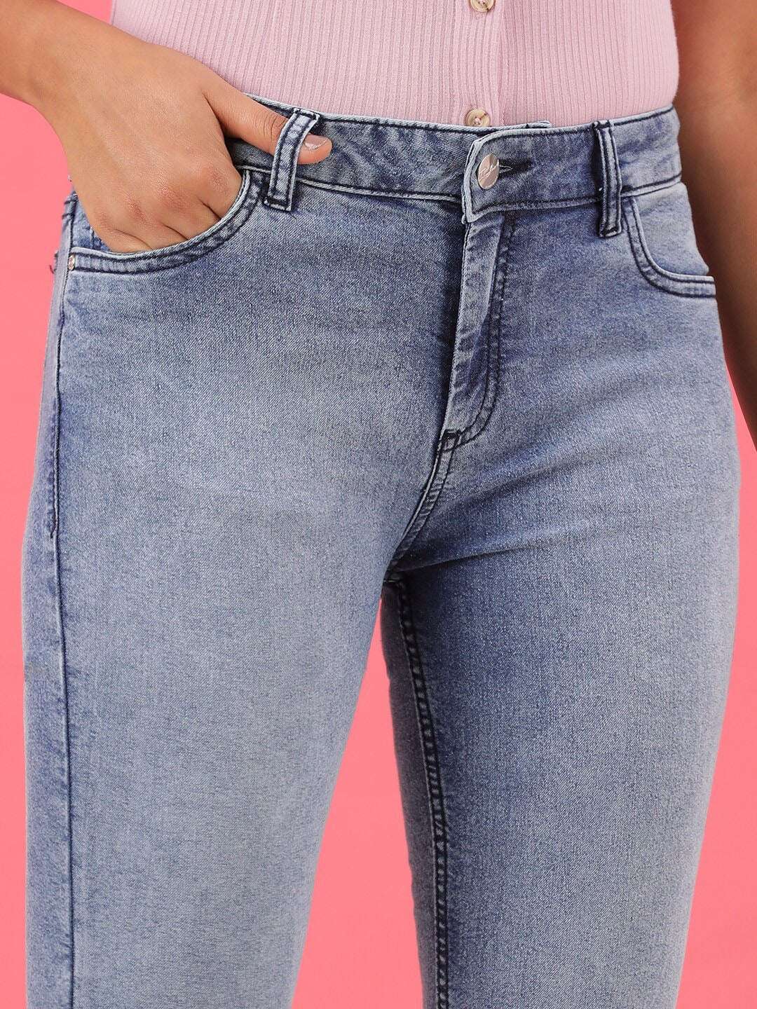 Shop Women Mid Wash Bootcut Denim Jeans Online.