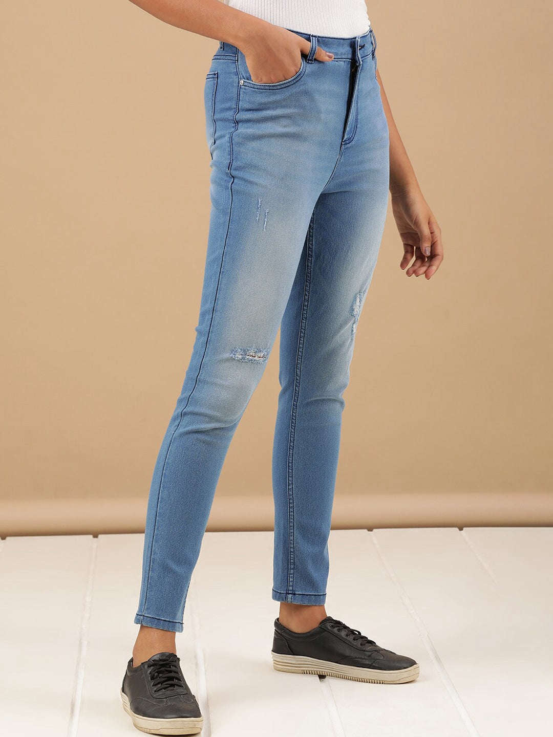 Shop Women Mid Wash Skinny Fit Denim Jeans Online.