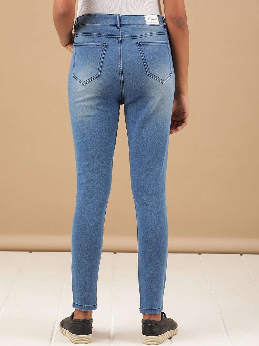 Shop Women Mid Wash Skinny Fit Denim Jeans Online.