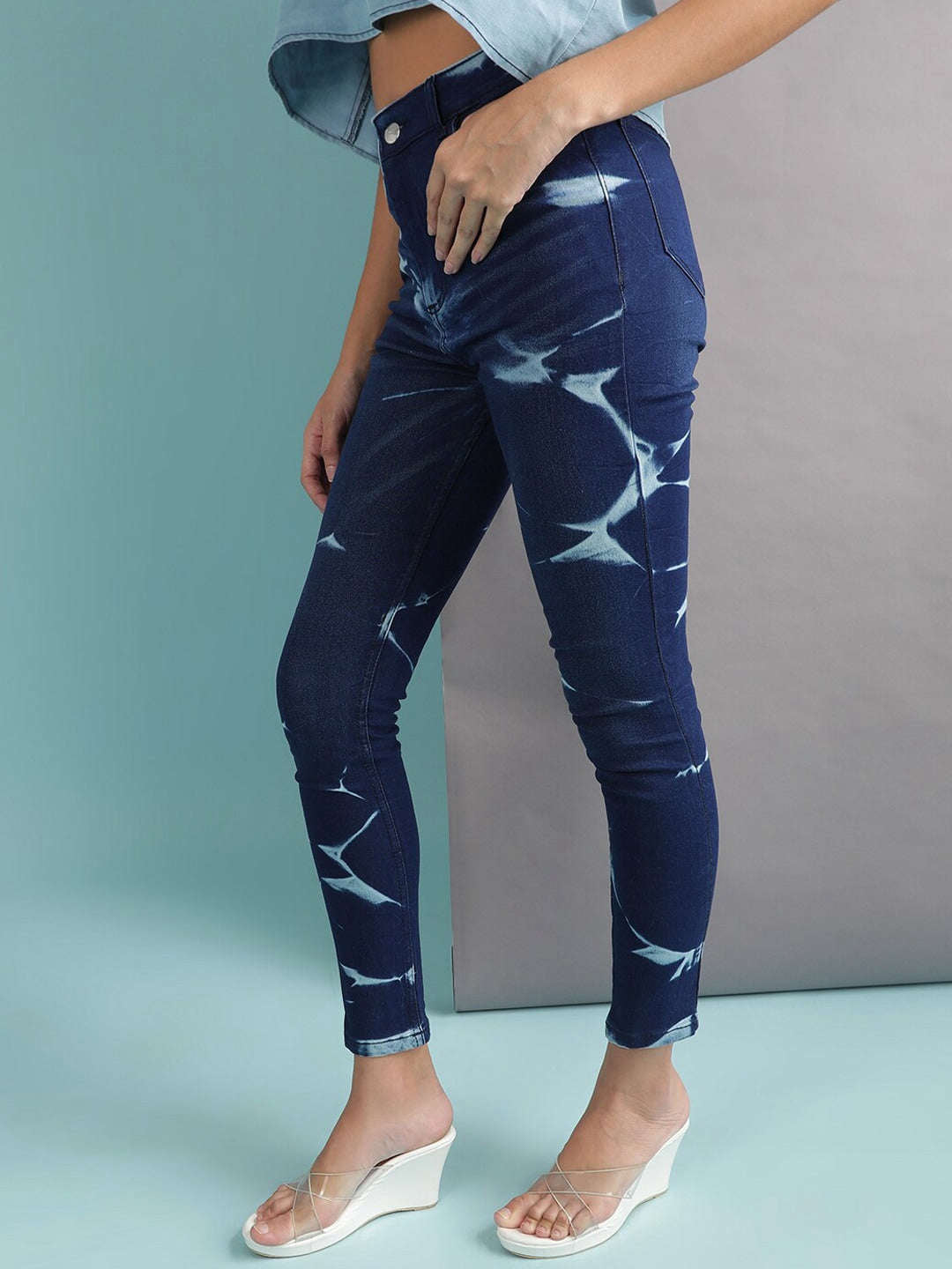 Shop Women Skinny Fit Denim Jeans With Tying Online.