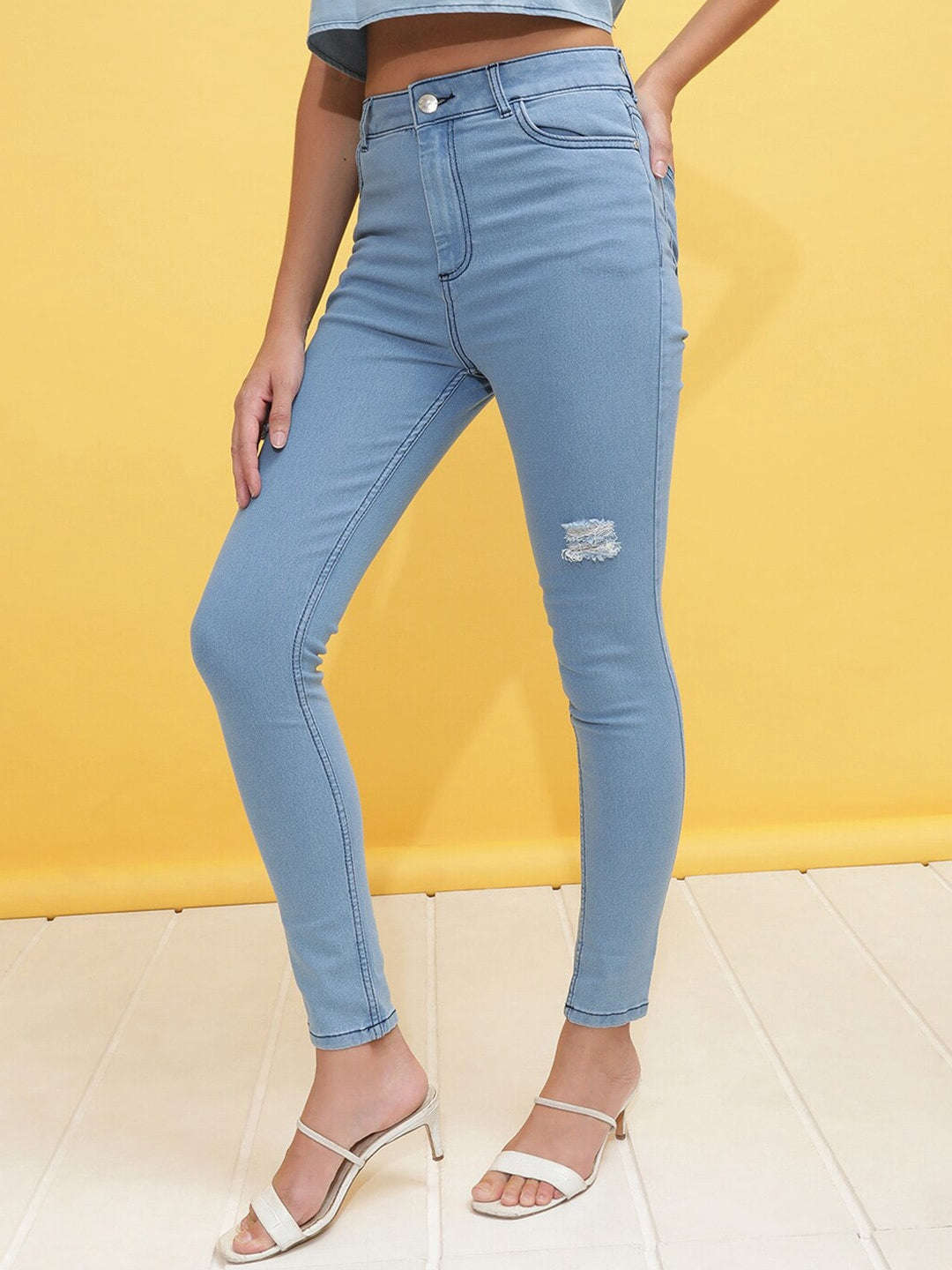 Shop Women Distressed Skinny Fit Denim Jeans Online.