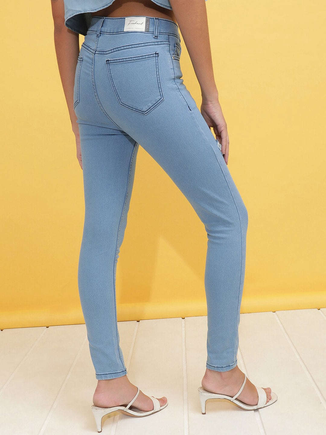 Shop Women Distressed Skinny Fit Denim Jeans Online.