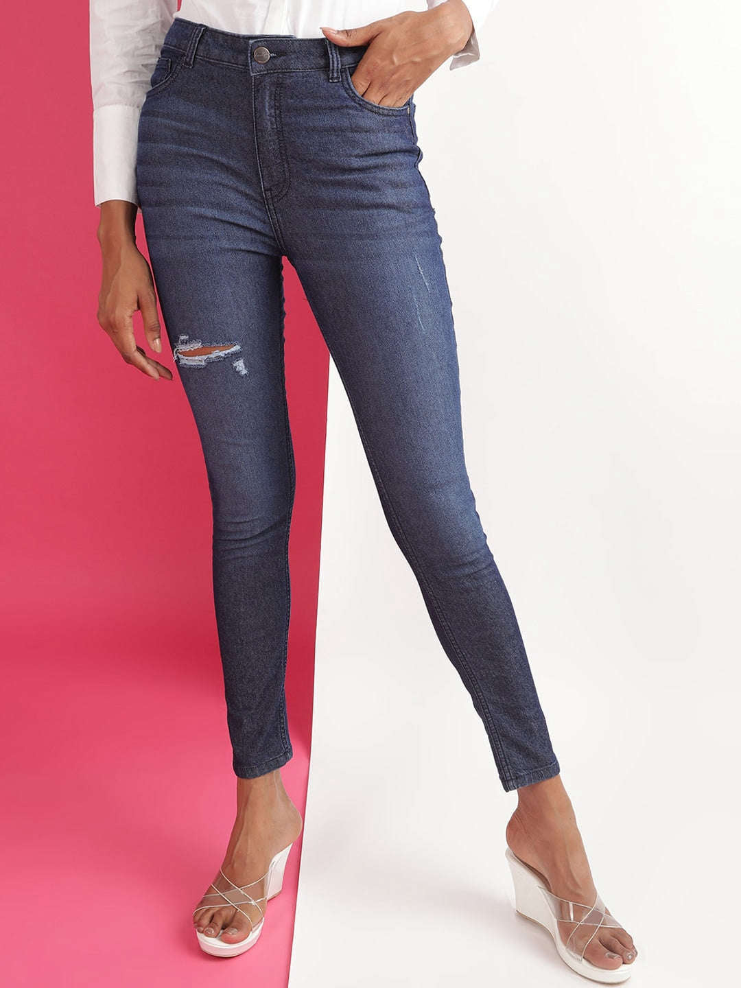 Shop Women Distressed Slim Fit Jeans Online.