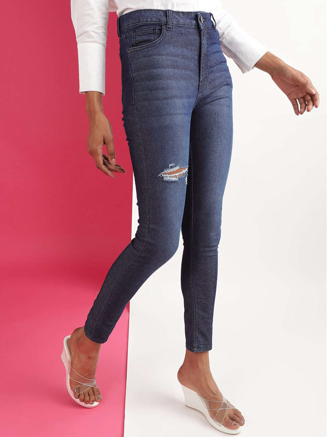 Shop Women Distressed Slim Fit Jeans Online.